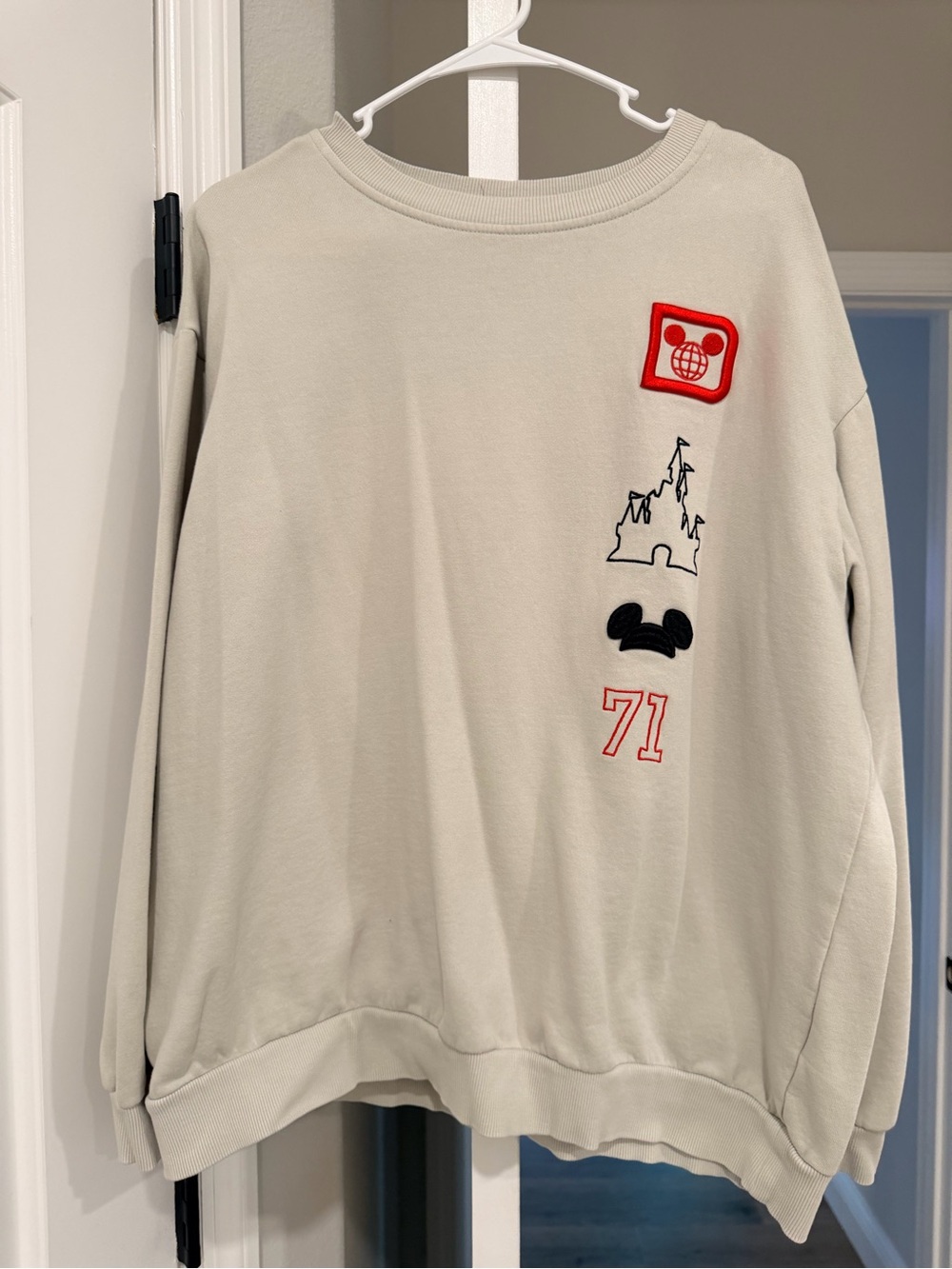 Disney parks Cream Crewneck Sweatshirt with Red Patch & Black Motif XL